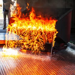 This image shows a fire test on Safespill&rsquo;s flooring system simulating a dropped wing tank.