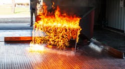 This image shows a fire test on Safespill’s flooring system simulating a dropped wing tank. This image shows a fire test on Safespill’s flooring system simulating a dropped wing tank.