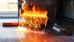 This image shows a fire test on Safespill&rsquo;s flooring system simulating a dropped wing tank.