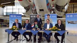 MoU signing ceremony on Oct. 18, 2021, at Fokker Techniek, in the Netherlands, witnessed by the mayor of Woensdrecht, Steven Adriaansen (standing left) and the governor of Noord Brabant, Ina Adema (standing right.) Seated (left to right): Jackson Schneider, president & CEO, Embraer Defense & Security; Arjan Meijer, president & CEO, Embraer Commercial Aviation; Menzo van der Beek, CEO of Fokker Services; Roland van Dijk, CEO of Fokker Techniek; and Johann Bordais, president & CEO, Embraer Services & Support. MoU signing ceremony on Oct. 18, 2021, at Fokker Techniek, in the Netherlands, witnessed by the mayor of Woensdrecht, Steven Adriaansen (standing left) and the governor of Noord Brabant, Ina Adema (standing right.) Seated (left to right): Jackson Schneider, president & CEO, Embraer Defense & Security; Arjan Meijer, president & CEO, Embraer Commercial Aviation; Menzo van der Beek, CEO of Fokker Services; Roland van Dijk, CEO of Fokker Techniek; and Johann Bordais, president & CEO, Embraer Services & Support.