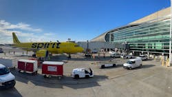 Spirit Airlines A320neo parked at Gate J33