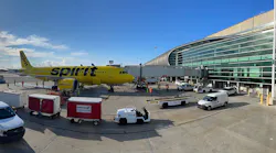 Spirit Airlines A320neo parked at Gate J33