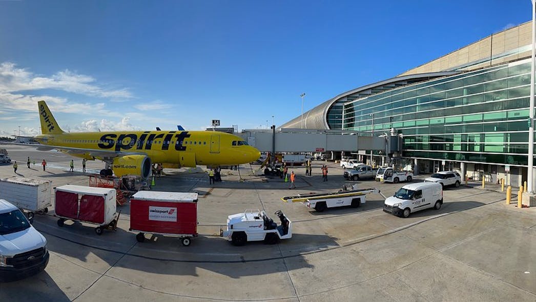 Spirit Airlines A320neo parked at Gate J33
