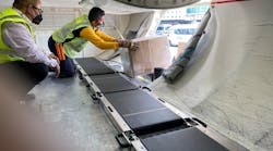 Tisabas Loading Boxes Into The Belly Tisabas Loading Boxes Into The Belly