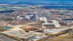 The construction of Sydney&rsquo;s new airport is directly injecting more than $100 million into businesses in Western Sydney, as new vision shows the incredible transformation of the site since earthworks began.