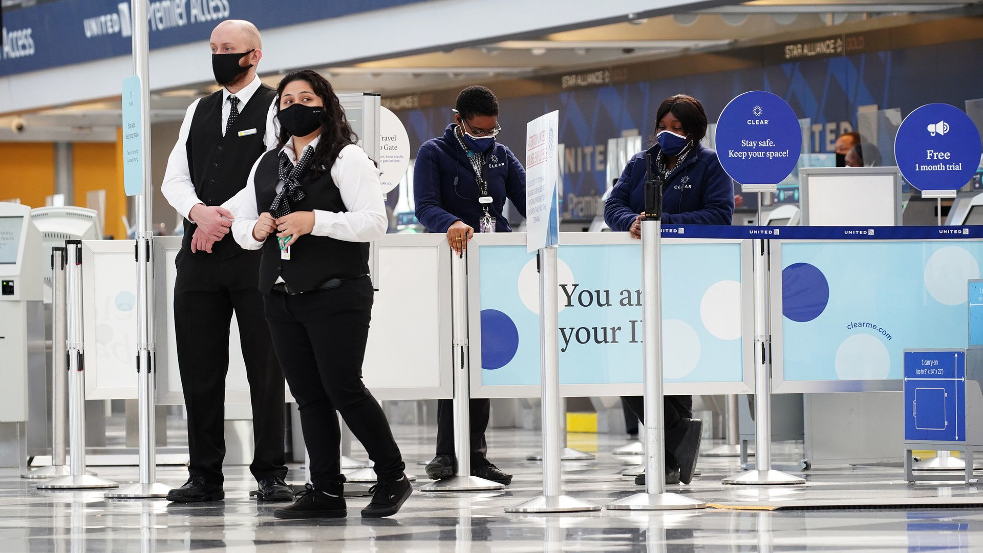 United Airlines employees stand in Terminal 1 at O'Hare International Airport, Oct. 1, 2020 in Chicago.