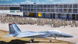 In a file image, cadets on the campus of the U.S. Air Force Academy march in formation between a jet plane and their dorms. Retired Gen. Gregory &apos;Speedy&apos; Martin said Saturday that former President George H.W. Bush&apos;s goal for the world powers to compete peacefully &apos;is where we would like to be&apos; in the nation&apos;s national security strategy.