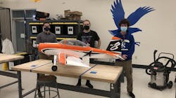 Embry-Riddle undergraduate students Joseph Ayd and Todd Martin assist master’s student Robert Moore in the project. Embry-Riddle undergraduate students Joseph Ayd and Todd Martin assist master’s student Robert Moore in the project.