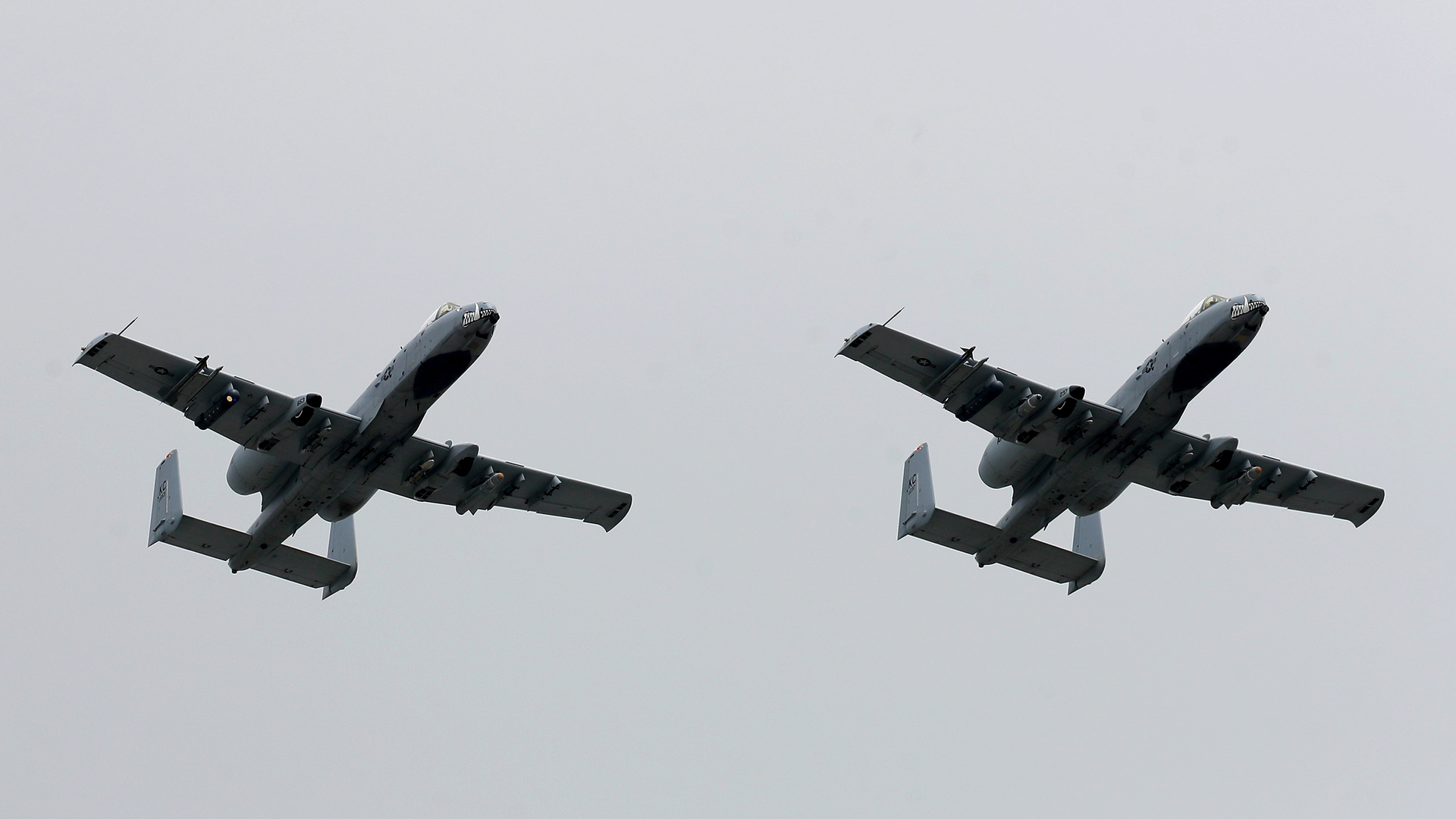 A pair of A-10 Thunderbolt II fly over prior to the NASCAR Cup Series Buschy McBusch Race 400 at Kansas Speedway on May 2, 2021 in Kansas City.