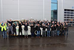The Phoenix E team celebrating delivery of the first customer vehicle.
