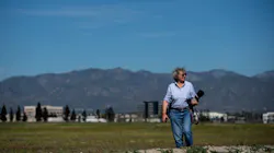 Carol Coy, Pomona Valley Audubon Society’s burrowing owl conservation committee member, surveys the land near Ontario Airport where burrowing owls nest on Wednesday, Feb. 26, 2020. A land lease was approved on Dec. 23, 2021, for nearly 200 acres of empty land east of the airport that have been the site of the burrowing owls and their nests. Carol Coy, Pomona Valley Audubon Society’s burrowing owl conservation committee member, surveys the land near Ontario Airport where burrowing owls nest on Wednesday, Feb. 26, 2020. A land lease was approved on Dec. 23, 2021, for nearly 200 acres of empty land east of the airport that have been the site of the burrowing owls and their nests.