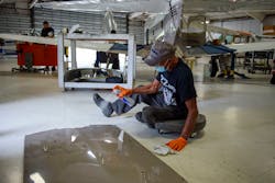 'This is where I started my dream as a kid to fly,' says Air Force veteran Jesse Branche while working on an airplane at V.I.P. Avionics at Hartford-Brainard Airport last summer.