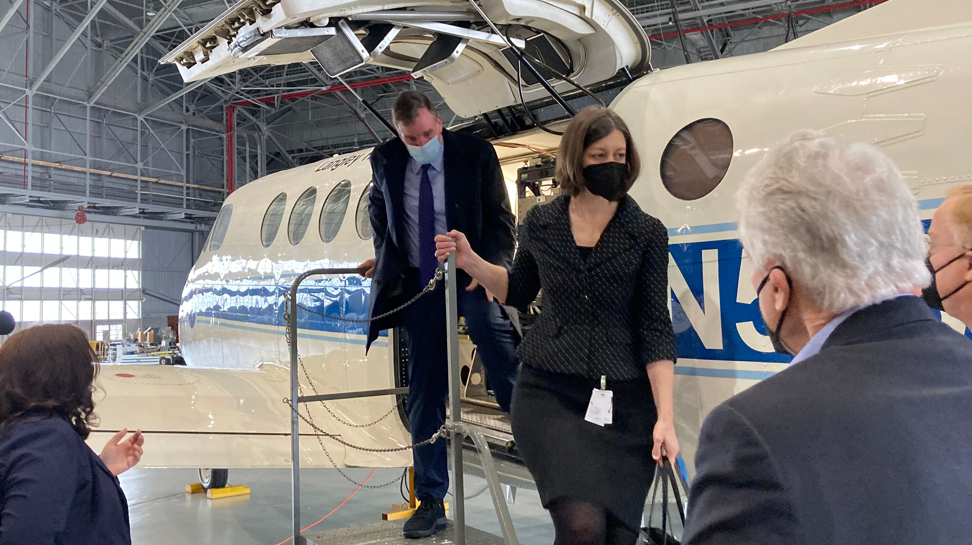 Sen Mark Warner and Rep Elaine Luria, D-Norfolk, get briefings on NASA Langley Research Center's current work.