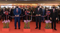 Left to right: S Iswaran, minister for Transport and Minister in Charge of Trade Relations; Dr. Ng Eng Hen, minister for Defense; and Ravinder Singh, chairman of Experia at the ribbon-cutting ceremony of Singapore Airshow 2022.