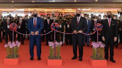 Left to right: S Iswaran, minister for Transport and Minister in Charge of Trade Relations; Dr. Ng Eng Hen, minister for Defense; and Ravinder Singh, chairman of Experia at the ribbon-cutting ceremony of Singapore Airshow 2022.