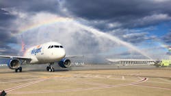 An Allegiant Air Airbus A319 receives a water-cannon salute on its inaugural flight to Dulles International Airport from Jacksonville, Florida in fall 2021.