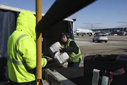 United Airlines ramp workers load baggage onto a plane at O'Hare International Airport in Chicago on Feb. 23, 2022. United Airlines ramp workers load baggage onto a plane at O'Hare International Airport in Chicago on Feb. 23, 2022.