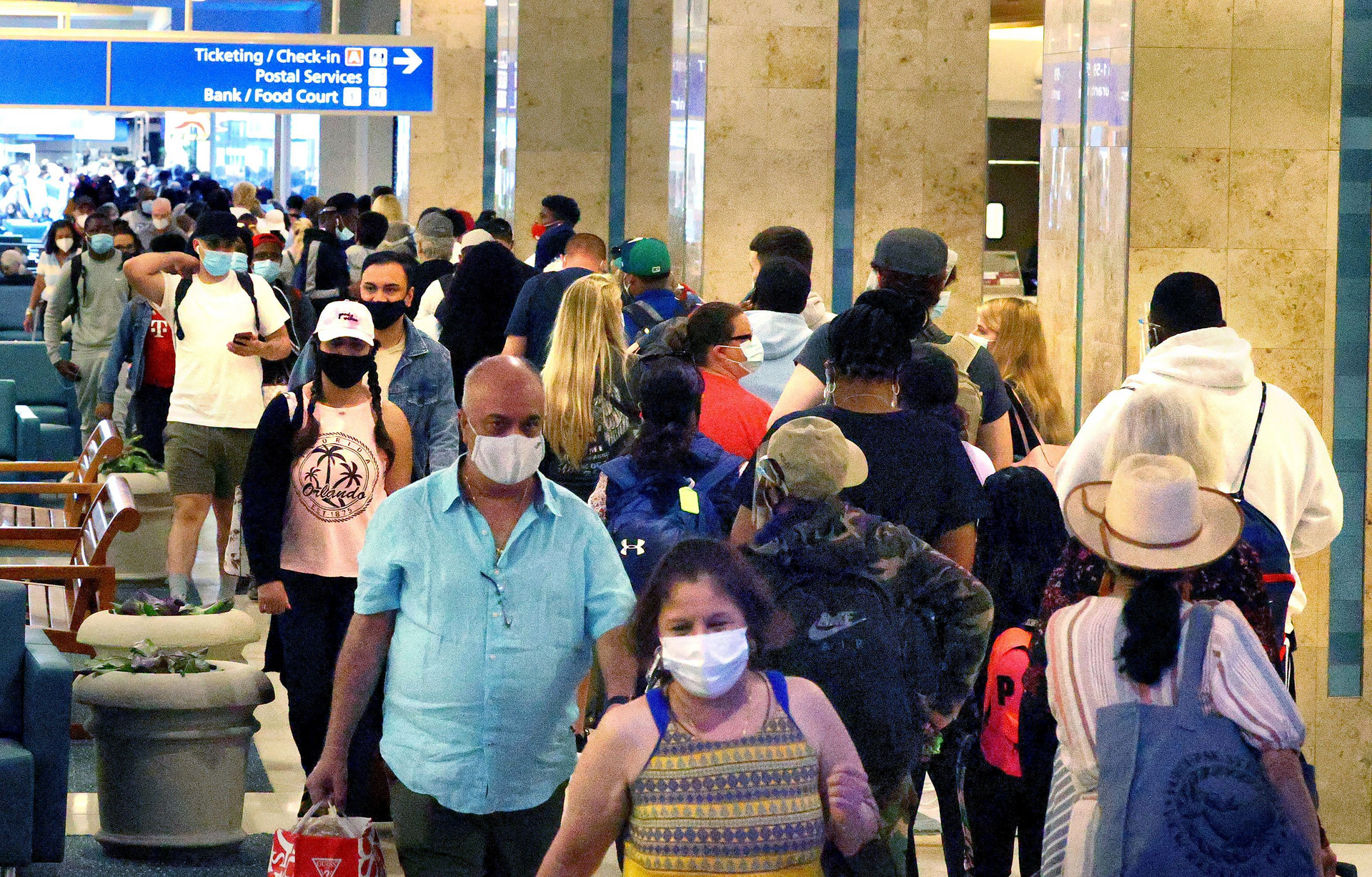 TSA check-in point at Orlando International Airport, Thursday, April 15, 2021. A TSA PreCheck program is opening in Nassau, Bahamas.