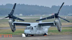 An MV-22 Osprey aircraft of the US Marine Corps is displayed on a runway during an air review ceremony at the Japan Air Self-Defense Force's Hyakuri air base in Omitama, Ibaraki prefecture on October 26, 2014.