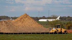 Cargo planes are visible behind the Bell Bowl Prairie adjacent to Chicago Rockford International Airport on Oct. 20, 2021, in Winnebago County. Cargo planes are visible behind the Bell Bowl Prairie adjacent to Chicago Rockford International Airport on Oct. 20, 2021, in Winnebago County.