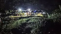 This photo taken on March 21, 2022, shows rescuers working at the site of a plane crash in Tengxian county, Wuzhou city, in China's southern Guangxi region. A China Eastern passenger jet carrying 132 people crashed onto a mountainside in southern China on March 21 causing a large fire, shortly after losing contact with air traffic control and dropping thousands of meters in just three minutes.