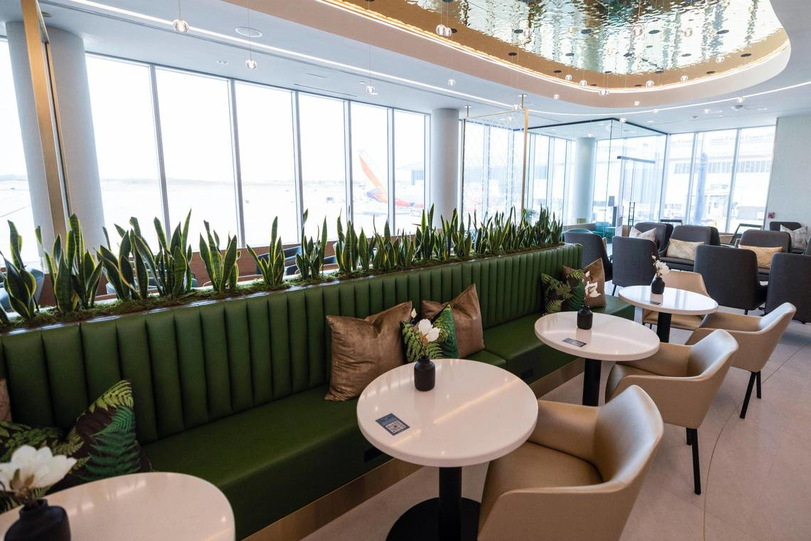 Customers at new airport lounge The Club CLT can order food directly to their tables.