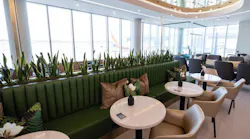 Customers at new airport lounge The Club CLT can order food directly to their tables.