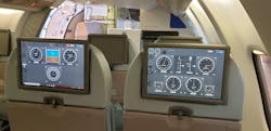 The project required a bespoke solution for the fitment of computer tablets and other equipment to each seat back of the flying classroom.