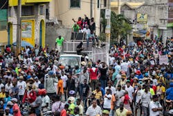 Haitians take to the streets to protest over the increasing insecurity in the Haitian capital Port-au-Prince, on Tuesday, March 29, 2022.