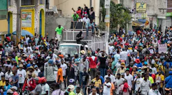 Haitians take to the streets to protest over the increasing insecurity in the Haitian capital Port-au-Prince, on Tuesday, March 29, 2022.