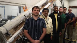 (L-R) UCF engineers Ladislav Vesely, Jayanta Kapat, Emmanual Gabriel-Ohanu, Marcel Otto, Erik Fernandez and Boeing representative Mike Stoia pose near a test rig needed for a supercritical carbon dioxide power cycle in a testing lab in Orlando on Thursday, March 31, 2022. (L-R) UCF engineers Ladislav Vesely, Jayanta Kapat, Emmanual Gabriel-Ohanu, Marcel Otto, Erik Fernandez and Boeing representative Mike Stoia pose near a test rig needed for a supercritical carbon dioxide power cycle in a testing lab in Orlando on Thursday, March 31, 2022.