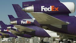 Federal Express cargo jets are lined up at the Memphis, Tennessee, Headquarters World Hub, where many of their 675 worldwide fleet of aircraft wait to be loaded with packages and documents, Oct. 9, 2008. Federal Express cargo jets are lined up at the Memphis, Tennessee, Headquarters World Hub, where many of their 675 worldwide fleet of aircraft wait to be loaded with packages and documents, Oct. 9, 2008.