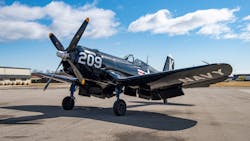 The newly repainted Corsair is parked outside EAA Kermit Weeks Hangar, prior to its return to the EAA Aviation Museum in early April 2022. The newly repainted Corsair is parked outside EAA Kermit Weeks Hangar, prior to its return to the EAA Aviation Museum in early April 2022.