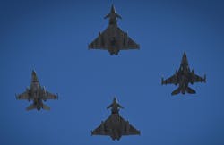 A Typhoon jet of the Royal Air Force (Up), a Typhoon jet of the Italian army (Bottom), an F-16 jet of the Romanian army (L) and a F-16 jet of the US Air Force fly in formation over the Mihail Kogalniceanu Air Base near Constanta, Romania, on April 8, 2022. A Typhoon jet of the Royal Air Force (Up), a Typhoon jet of the Italian army (Bottom), an F-16 jet of the Romanian army (L) and a F-16 jet of the US Air Force fly in formation over the Mihail Kogalniceanu Air Base near Constanta, Romania, on April 8, 2022.
