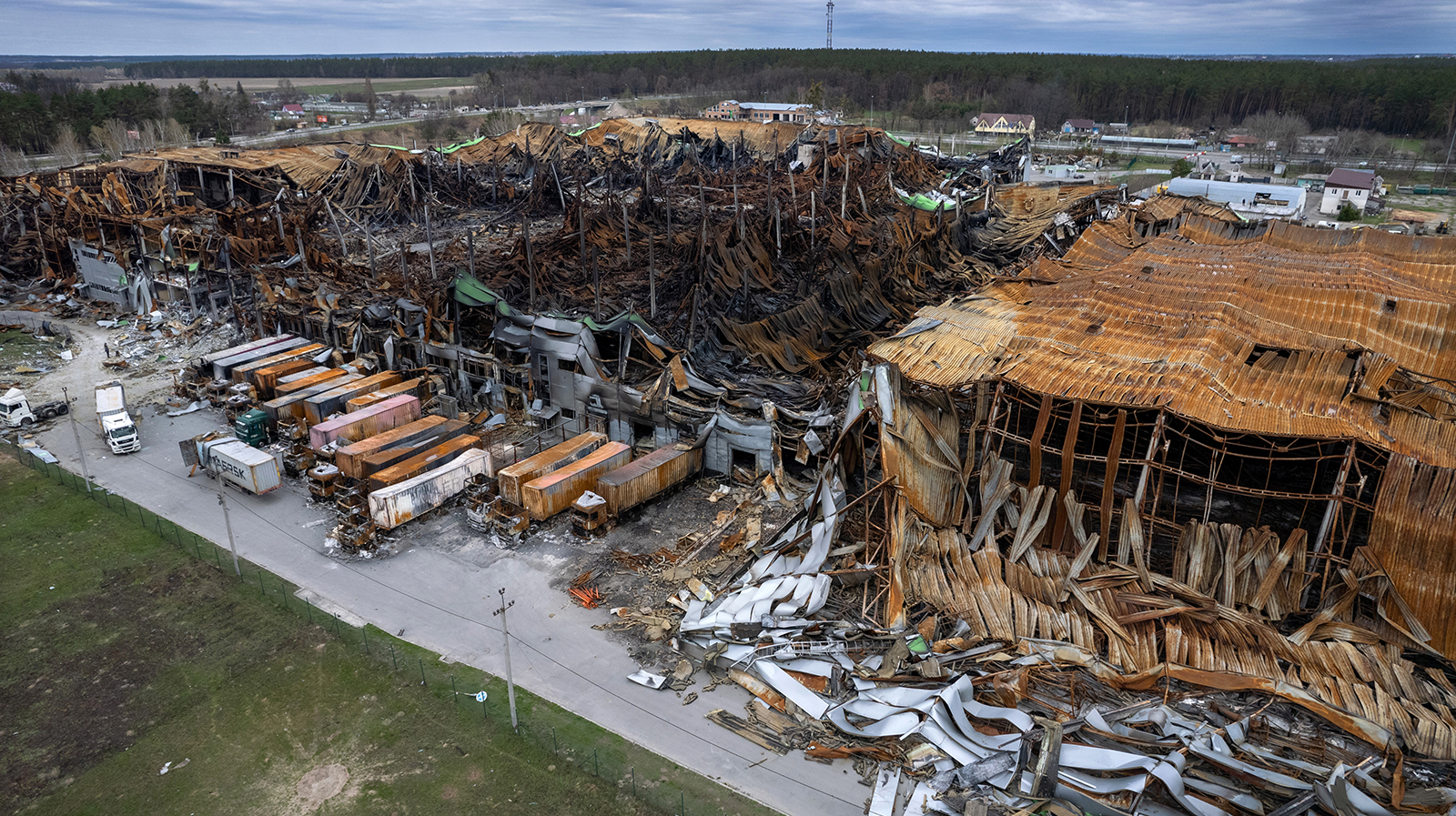 As seen from a drone in the air, the massive Komodor logistics park lies in ruins, after being bombed and burnt during the Russian invasion on April 19, 2022, near Makarov, Ukraine.