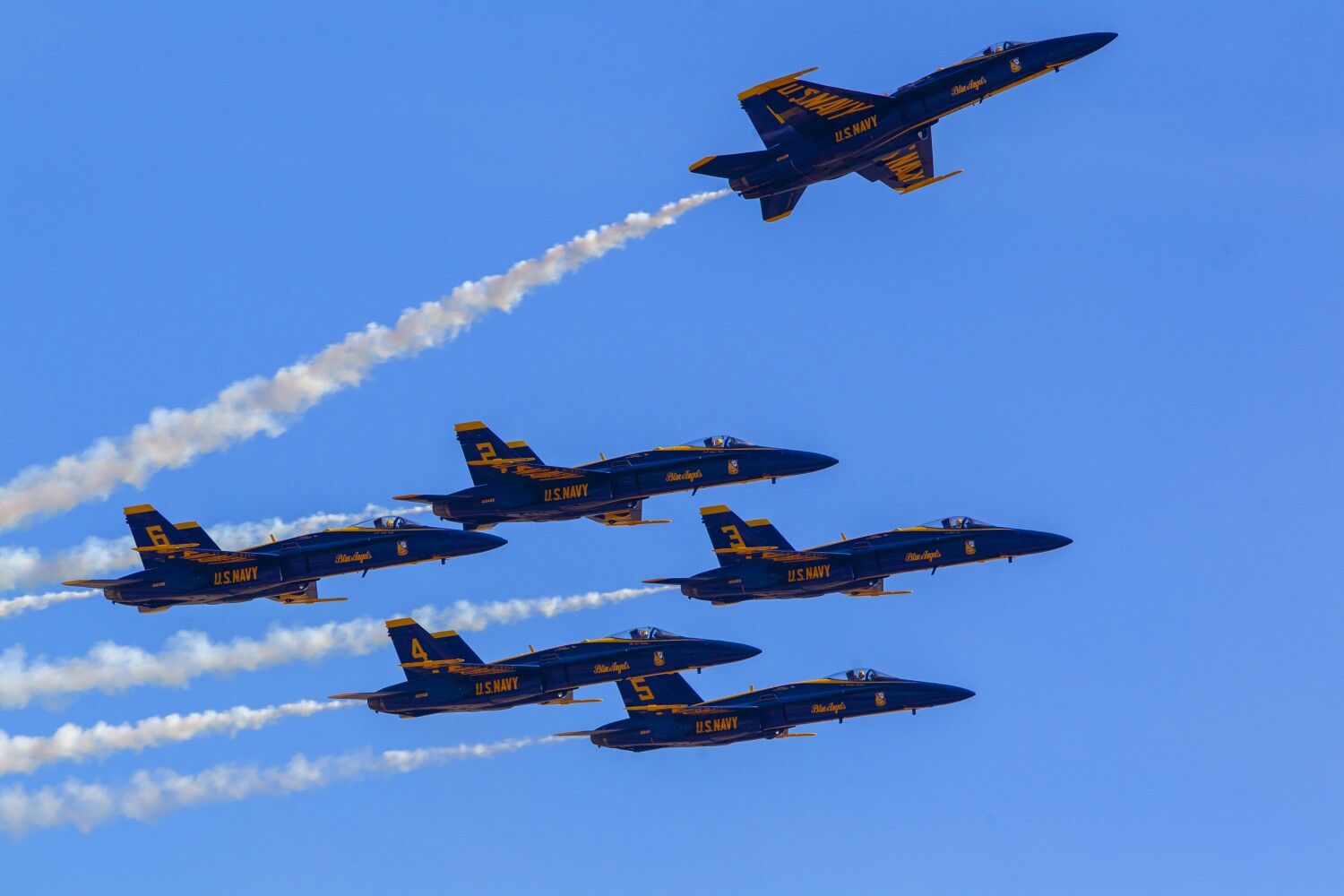 On Sunday Day-3 of the MCAS Miramar Air Show the Blue Angels fly over Miramar show center as they demonstrate one of the aerobatic his speed maneuvers.