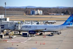 A JetBlue jet is parked at the gate at Terminal A at Bradley International Aiport, December 23, 2021. A JetBlue jet is parked at the gate at Terminal A at Bradley International Aiport, December 23, 2021.