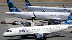 Jet Blue planes at Logan Airport on April 4, 2022, in Boston.