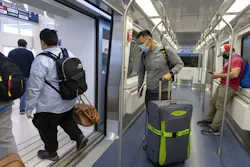 Passengers disembark from an Airport Transit System train on April 18, 2022, at O'Hare International Airport. Passengers disembark from an Airport Transit System train on April 18, 2022, at O'Hare International Airport.