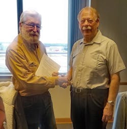 Beaver Aviation President and Owner Charles Swain and Wisconsin Aviation President and CEO Jeff Baum shake hands after the acquisition closing. Beaver Aviation President and Owner Charles Swain and Wisconsin Aviation President and CEO Jeff Baum shake hands after the acquisition closing.