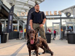 Koosa, a Global K9 Protection Group canine, and handler Jose. Koosa, a Global K9 Protection Group canine, and handler Jose.