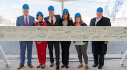 The Gerald R. Ford International Airport raised a ceremonial beam to celebrate its $110 million expansion of Concourse A.