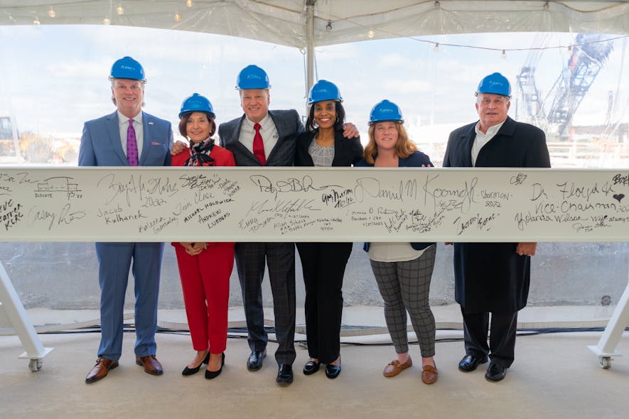 The Gerald R. Ford International Airport raised a ceremonial beam to celebrate its $110 million expansion of Concourse A.