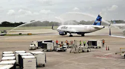 JetBlue Flight No. 387 taxis on to the runway under a water canon salute as it departs for Cuba. On Wednesday, August 31, 2016 JetBlue became the first U.S. airline to initiate commercial flights with Cuba, kicking off with a flight from Fort Lauderdale-Hollywood International Airport to Santa Clara, Cuba.