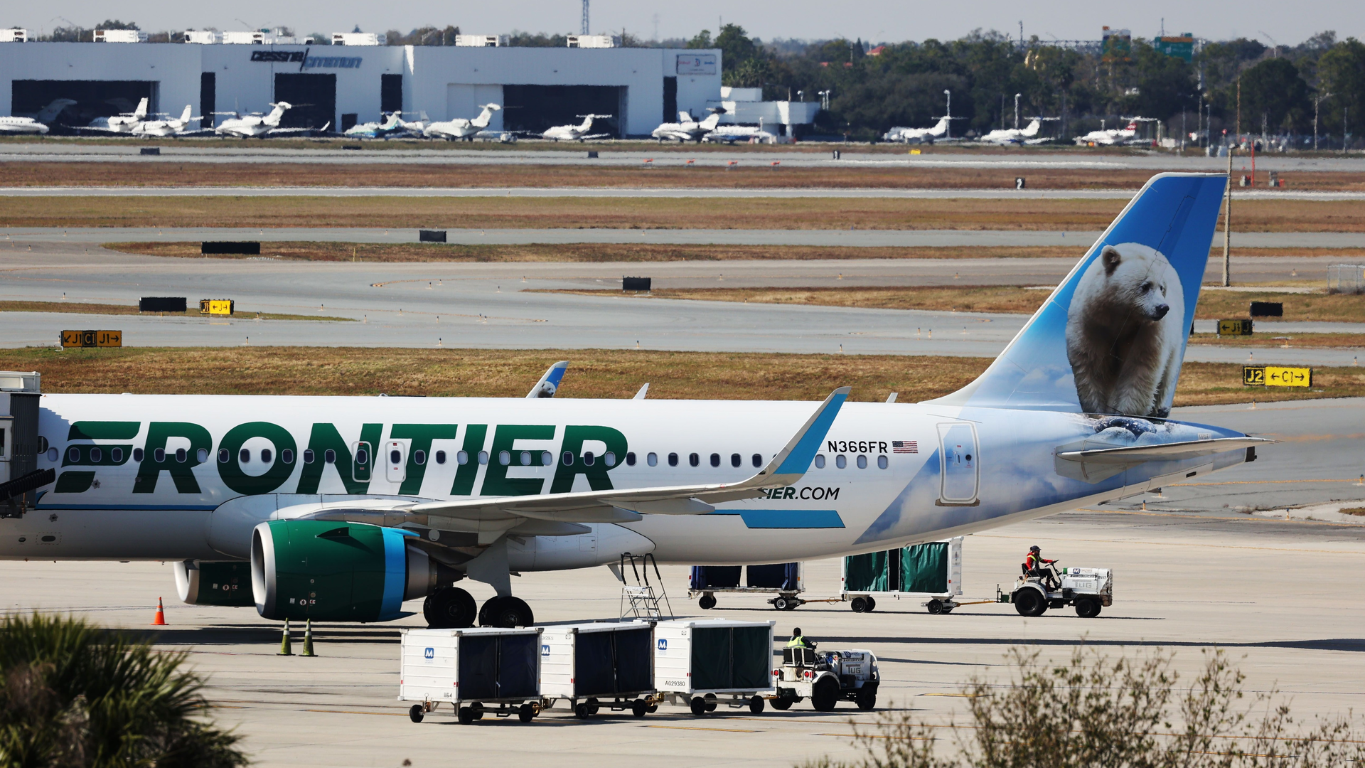 Frontier Airlines aircraft at the Orlando International Airport, on Monday, February 7, 2022. Spirit and Frontier Airlines on Monday announced a $6.6 billion merger, a combination of low-fare carriers that would create Americas fifth-largest airline.