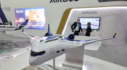 This picture taken on November 14, 2021 shows a mockup of one of the blended-wing body concepts of the 'Airbus ZEROe' zero-emissions hybrid-hydrogen aircraft, at the booth of a European multinational aerospace corporation Airbus SE, during the 2021 Dubai Airshow in the Gulf emirate.