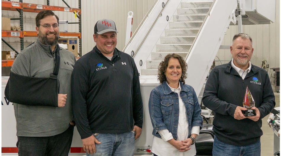 From left, Jason Johnson, VP of business development; Brandon Haubenschild, production manager; Amy Hinzmann, CFO/COO; and Craig Kruckeberg, CEO/CVO, accepted Stinar&rsquo;s Product Leader of the Year recognition.