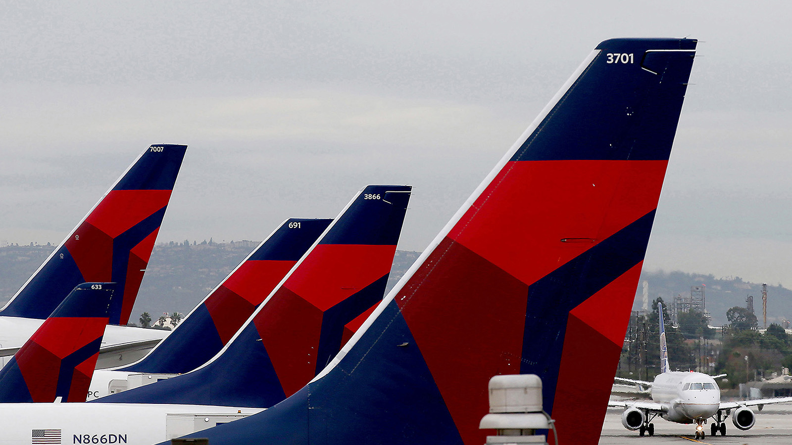 Delta jets are lined up at Los Angeles International Airport. Delta has introduced its Airbus Air321neo jet, along with its routes.