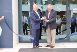 Lee Woodward, CEO, Skyborne (left), and Rick Monday, former Major League Baseball player and sports broadcaster (right), cutting the ribbon in front of the new training center. Lee Woodward, CEO, Skyborne (left), and Rick Monday, former Major League Baseball player and sports broadcaster (right), cutting the ribbon in front of the new training center.
