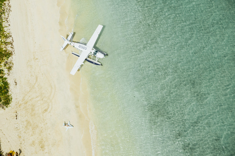 Coco Bahama Seaplane Arrival at Kamalame Cay Private Island Resort, Bahamas.